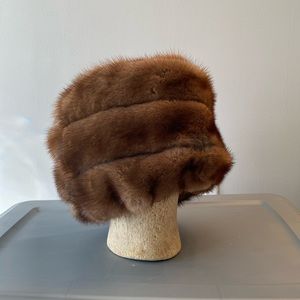 Mink and leather hat, handmade.  Hat trimmed in brown leather.